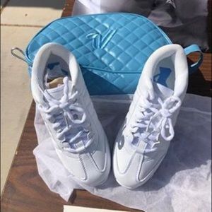 Never worn varsity cheer shoes with case. Size 5